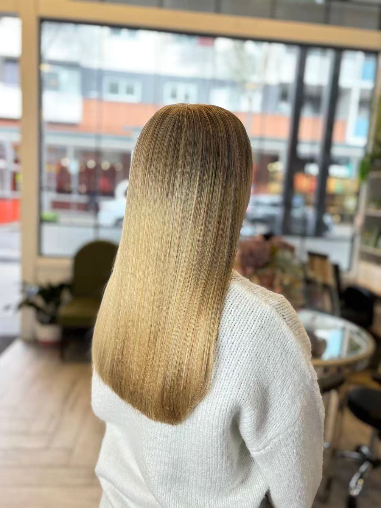 Glossy, smooth hair botox treatment result on blonde hair by Didi at Hair Talks Rouse Hill