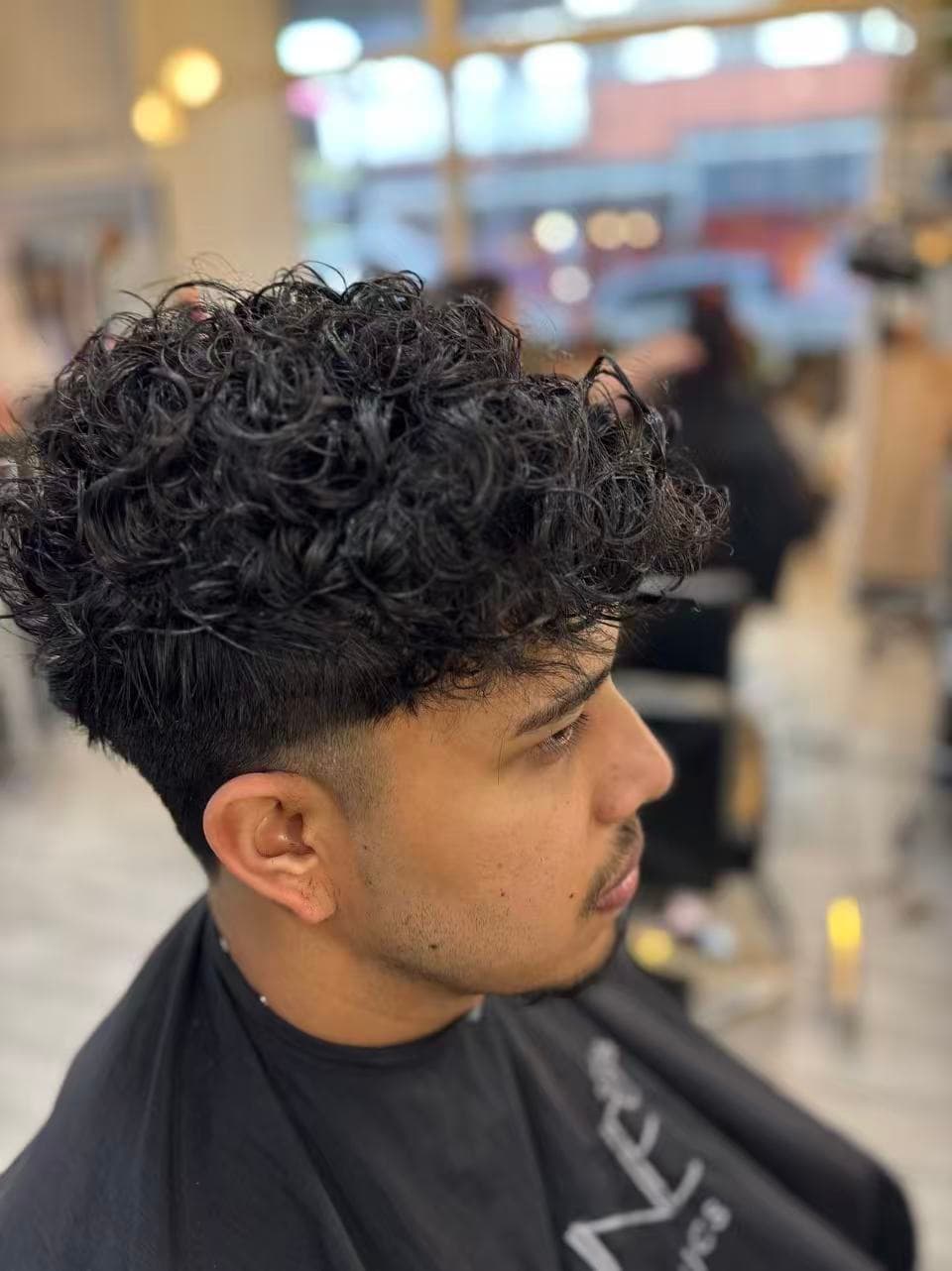 Men's curly perm with fade by Didi at Hair Talks Rouse Hill