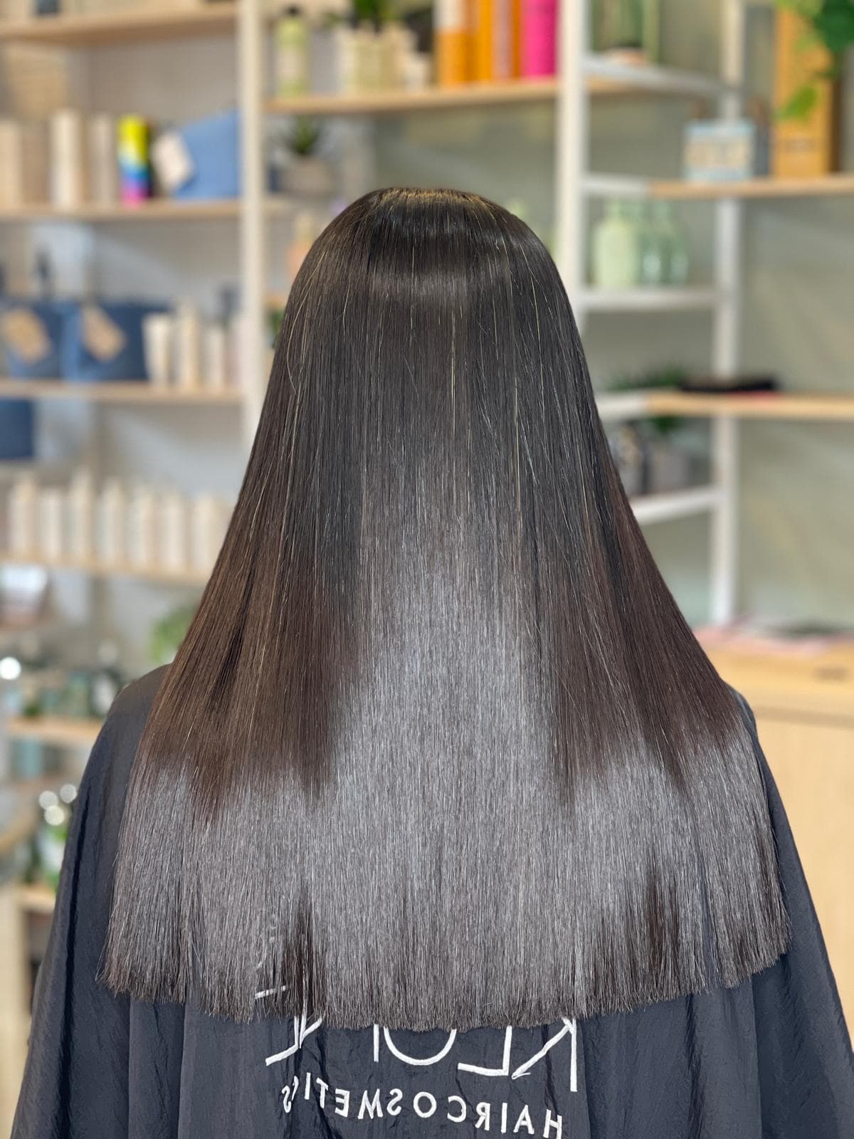 Glossy, smooth brunette hair result by Ryan at Hair Talks Rouse Hill
