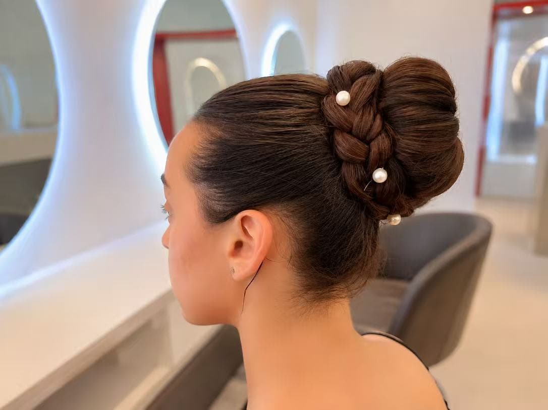 Braided bun updo with pearl accents by Sharon at Hair Talks Rouse Hill