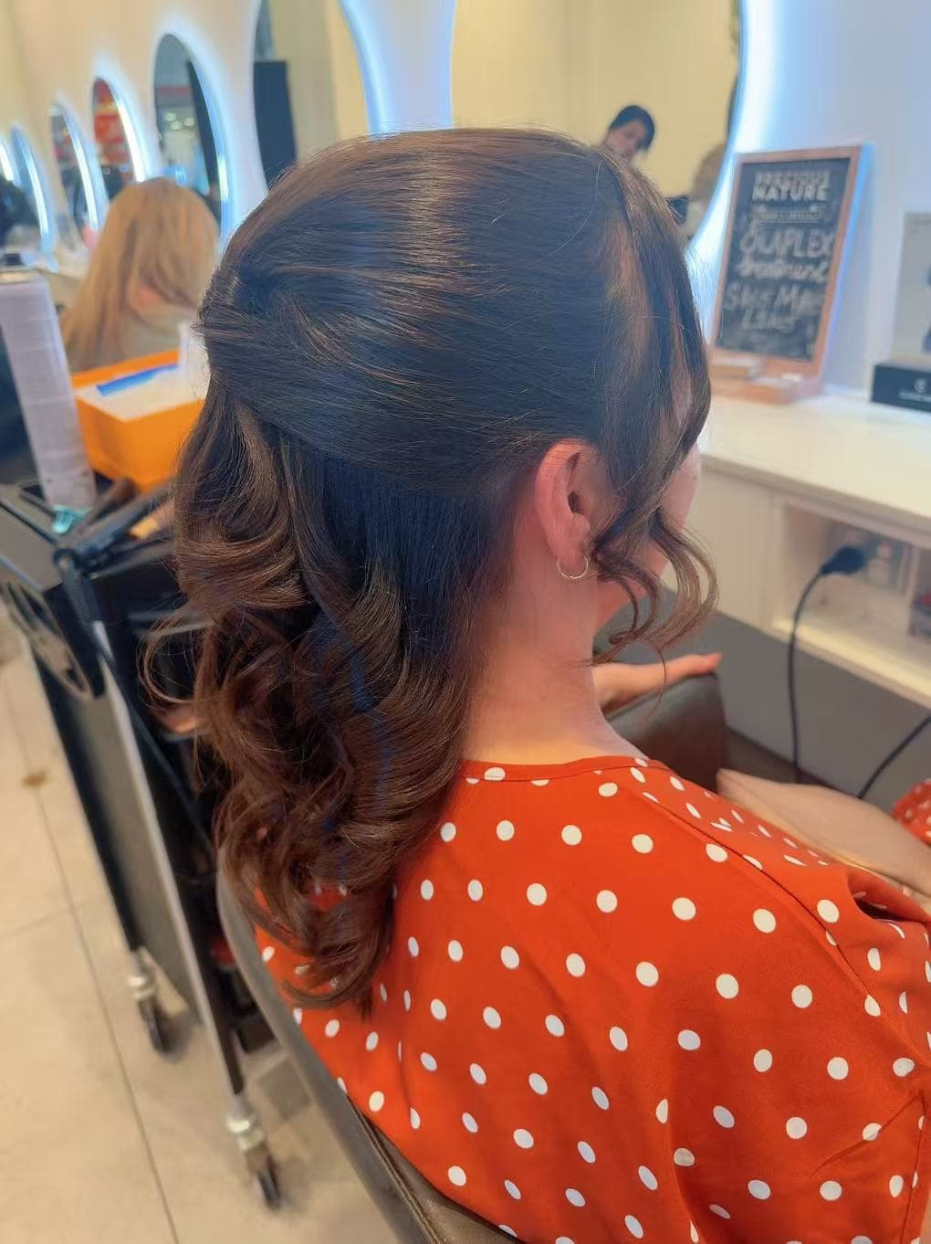 Half-up curled style on natural brunette hair by Sharon at Hair Talks Rouse Hill